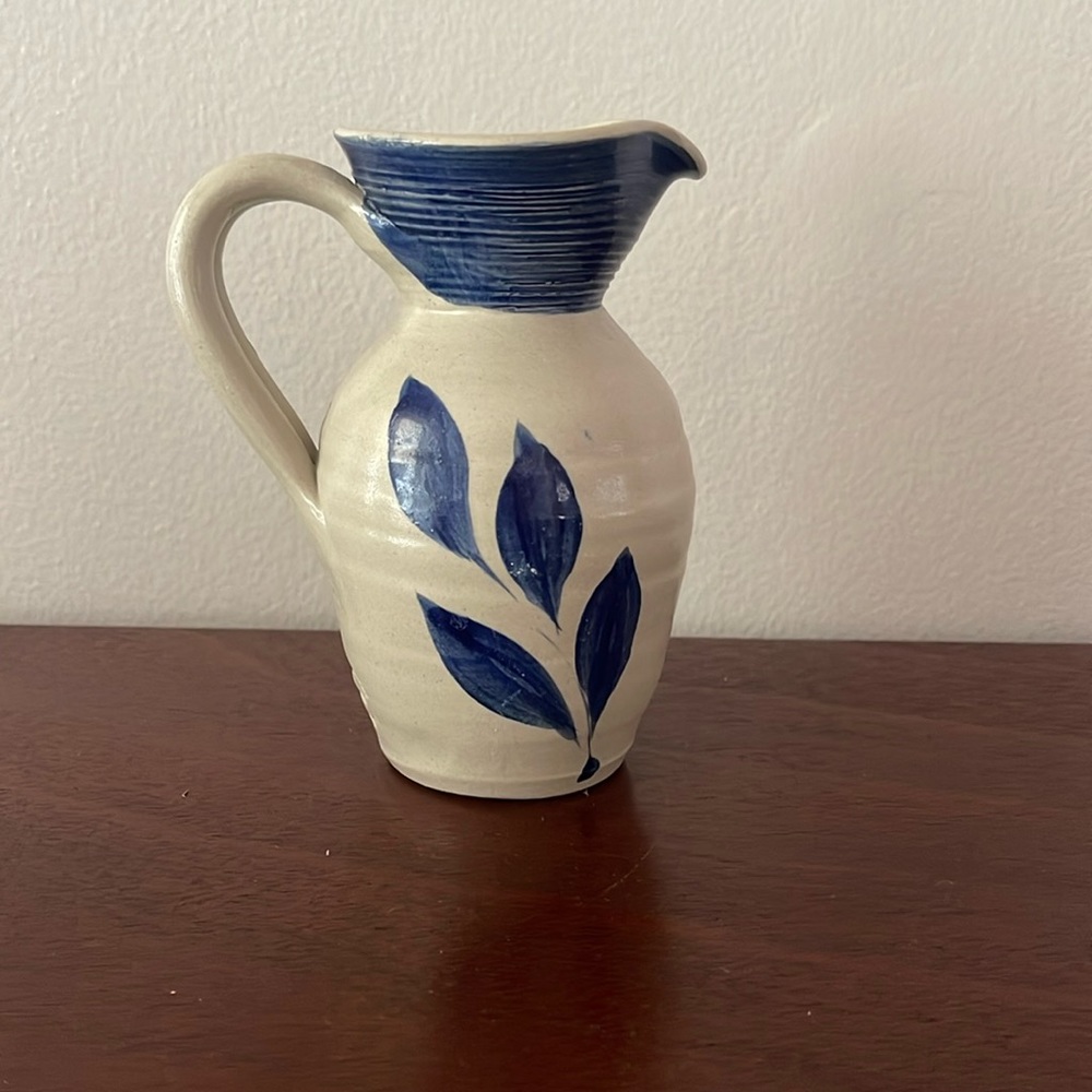 Williamsburg pottery pitcher in perfect condition. Stands 6 inches in height.